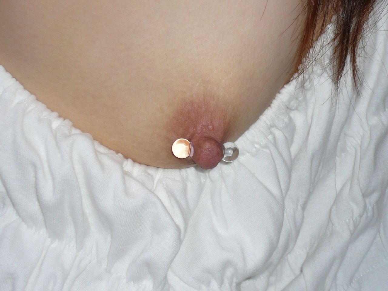 Gauged nipple piercing